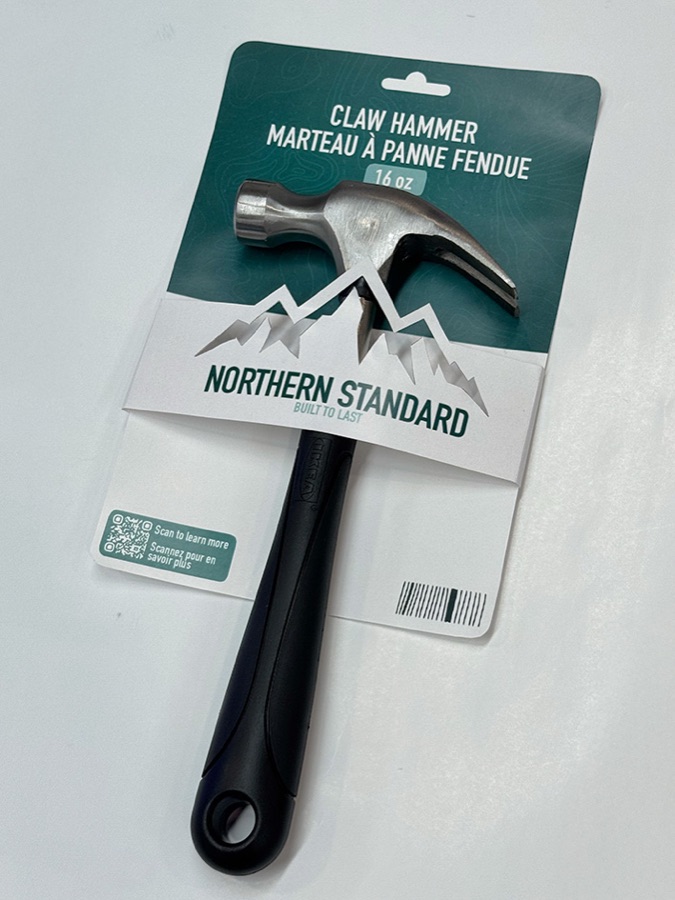 First printed prototype with mountain landscape artwork wrapping a claw hammer